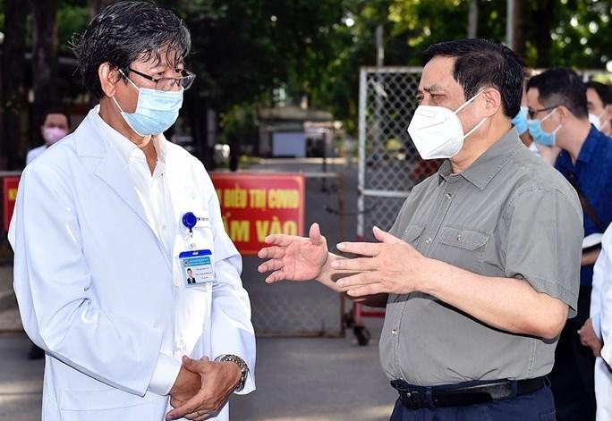 Thủ tướng chỉ đạo kiểm tra, làm rõ thông tin ‘tiêm vắc xin không cần đăng ký’ - Ảnh 1. Thủ tướng chỉ đạo kiểm tra, làm rõ thông tin ‘tiêm vắc xin không cần đăng ký’ - Ảnh 1.