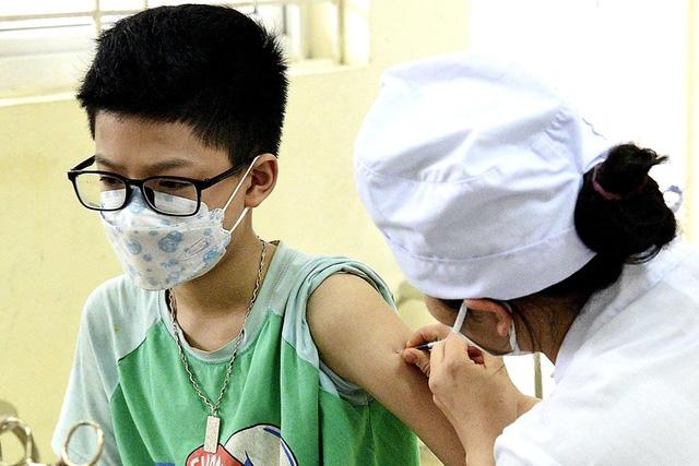 Hà Nội đồng loạt tiêm vaccine phòng COVID-19 cho trẻ từ 5 đến dưới 12 tuổi - Ảnh 1.