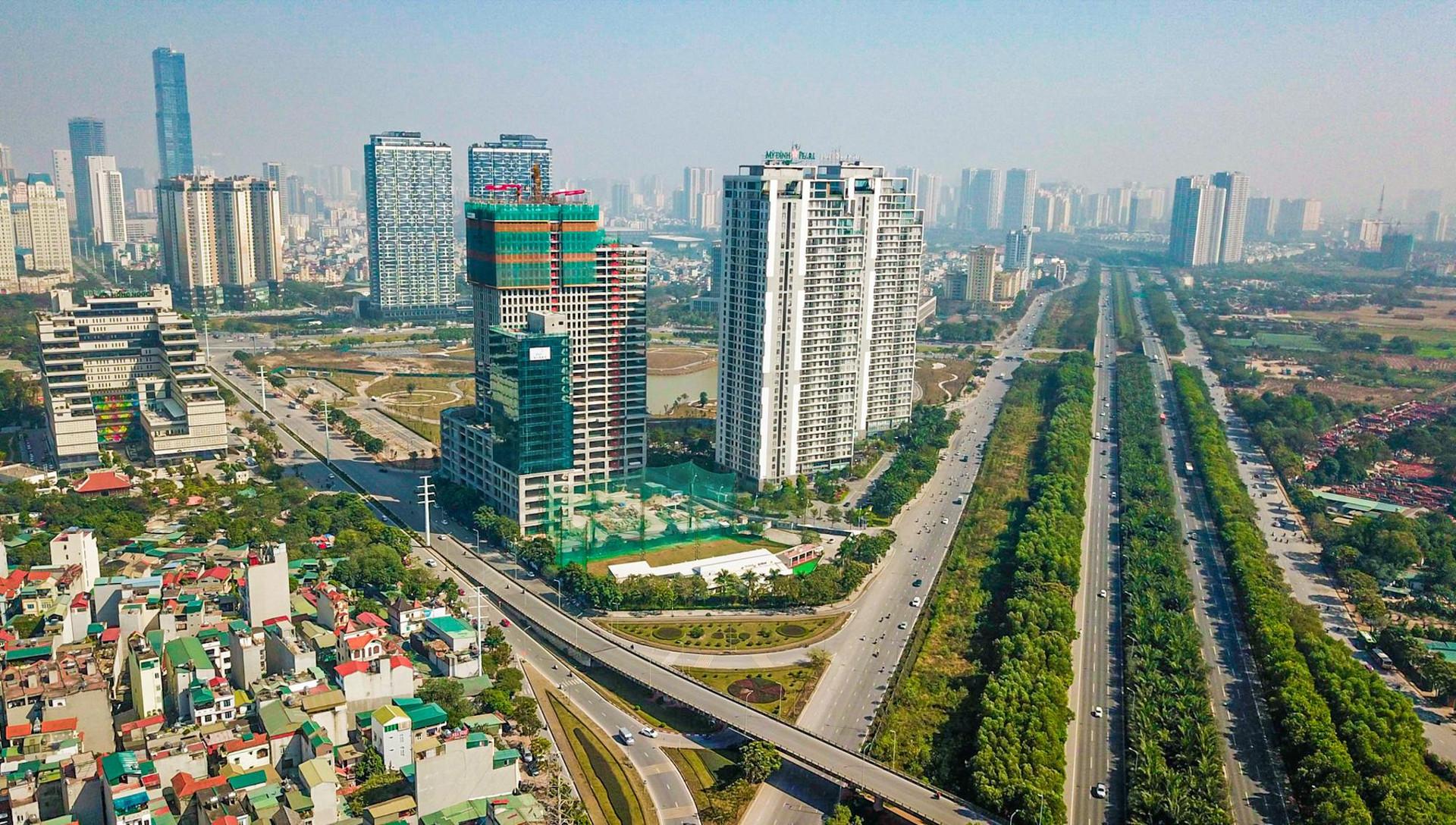 [Photo Essay] Đại Lộ Thăng Long - "bến đỗ" của loạt đại gia bất động sản - Ảnh 5.