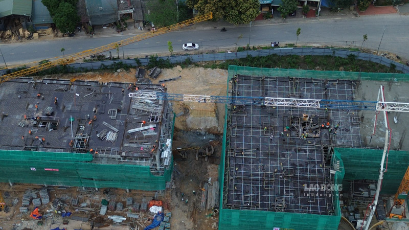 Hàng trăm công nhân đang miệt mài làm việc tại dự án nhà ở xã hội ở xã Vạn Hòa (TP Lào Cai). Ảnh: Đinh Đại