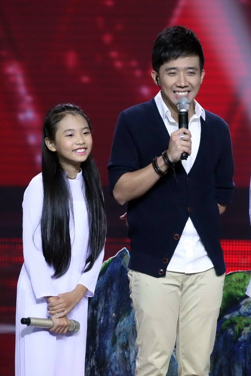 Trấn Thành dẫn Giọng hát Việt nhí năm 2013. Ảnh: Nhà sản xuất The Voice Kid