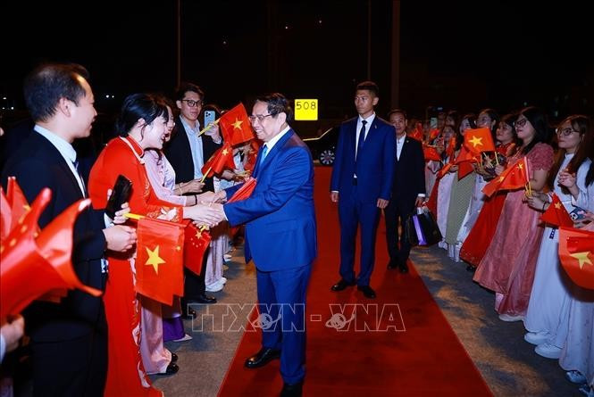 Lễ tiễn Thủ tướng Phạm Minh Chính kết thúc chuyến tham dự Hội nghị WEF 16 Thiên Tân và làm việc tại Trung Quốc. (Ảnh: Dương Giang/TTXVN)