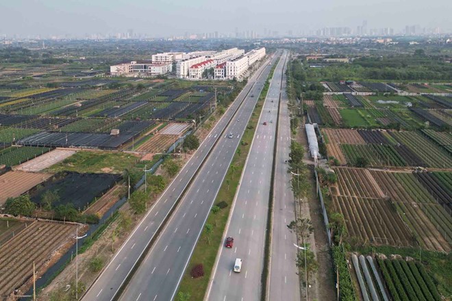 Đường Tây Thăng Long đoạn qua phường Tây Tựu, Hà Nội. Ảnh: Hữu Chánh