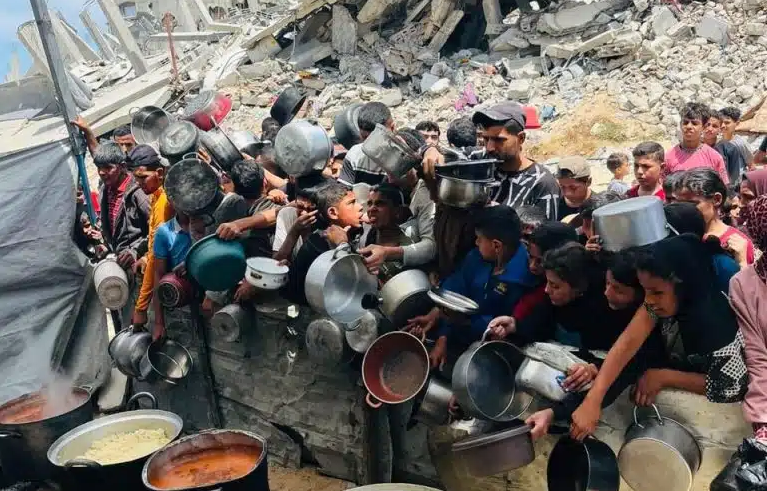 Một địa điểm phân phối thức ăn cho người dân Gaza. Ảnh: Khaled Qadas/PassBlue