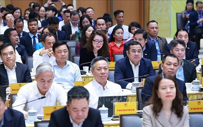 Các đại biểu dự Hội nghị Doanh nghiệp góp phần vào tăng trưởng hai con số. Ảnh: Dương Giang/TTXVN